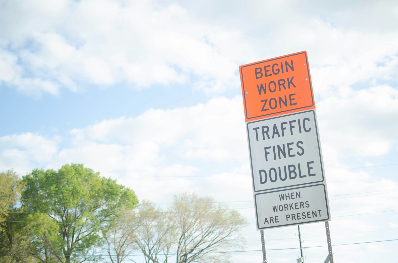 a traffic sign on the side of the road